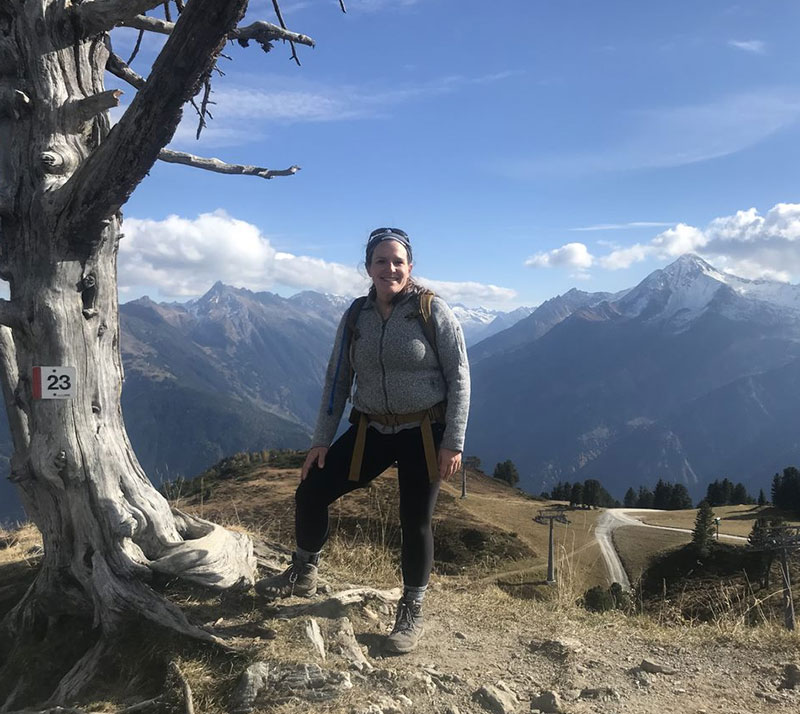 female on a hike in the mountains