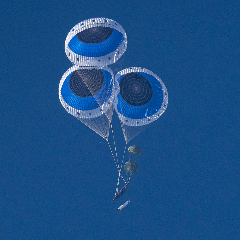 target vehicle floating with parachutes