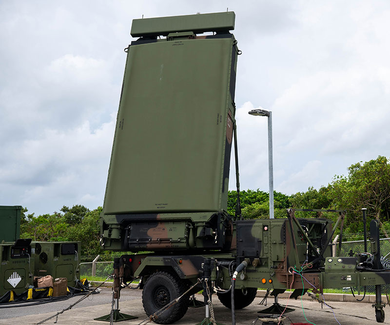 Military-grade mobile radar system mounted on a truck for battlefield surveillance and target detection.