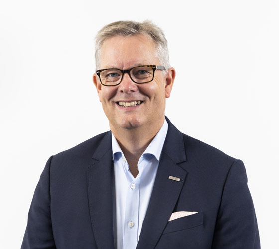 headshot of man smiling 