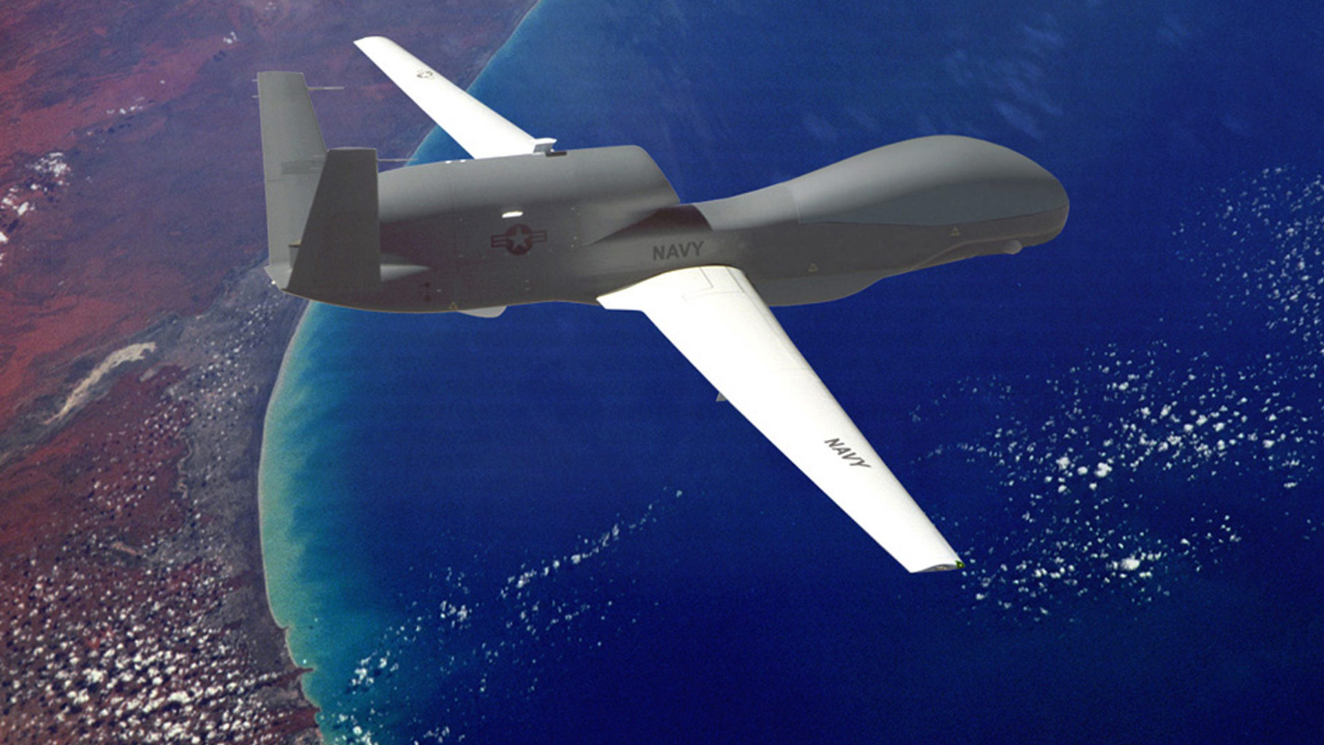 Global Hawk flying above water