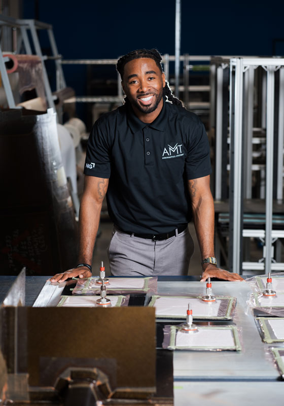 engineer standing at desk