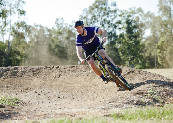 photo of person riding mountain bike