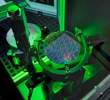A Silicon Multi-Project Wafer (MPW) going through flat alignment prior to being processed in one of ATL’s Class 100 cleanroom.