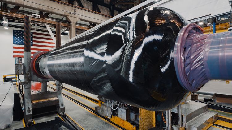 Northrop Grumman performs the insulation layup and composite case wind of its 2024 SMART Demo solid rocket motor case. The innovative case design and build, scheduled to complete in August, will be structurally tested in September and complete static test in December as part of the company’s second annual demonstration. (Photo Credit: Northrop Grumman) RAPID ITERATION & TESTING