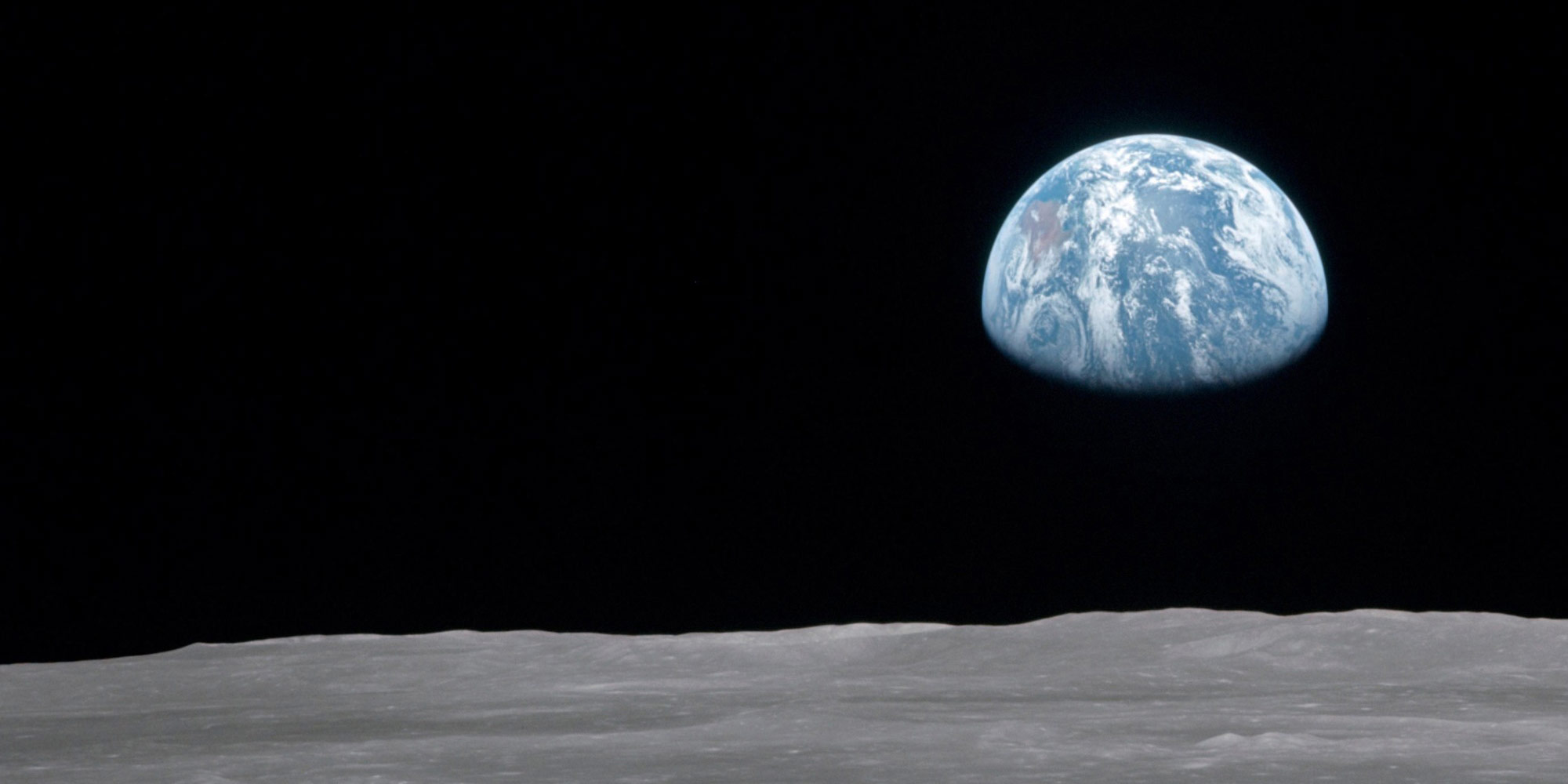 Earthrise above the Moon