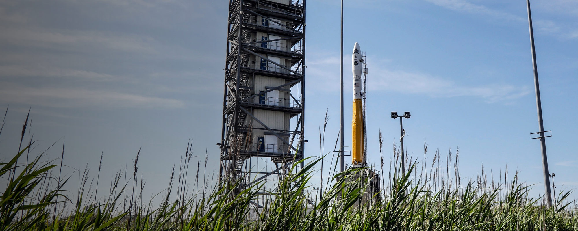 Minotaur rocket on launch pad under blue skies