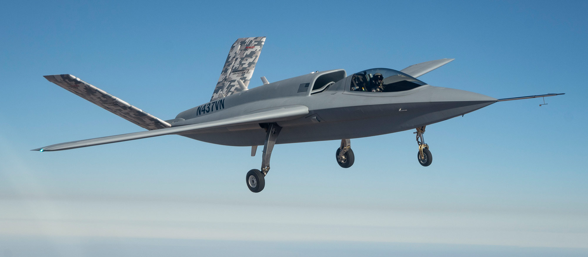 aircraft flying in blue skies