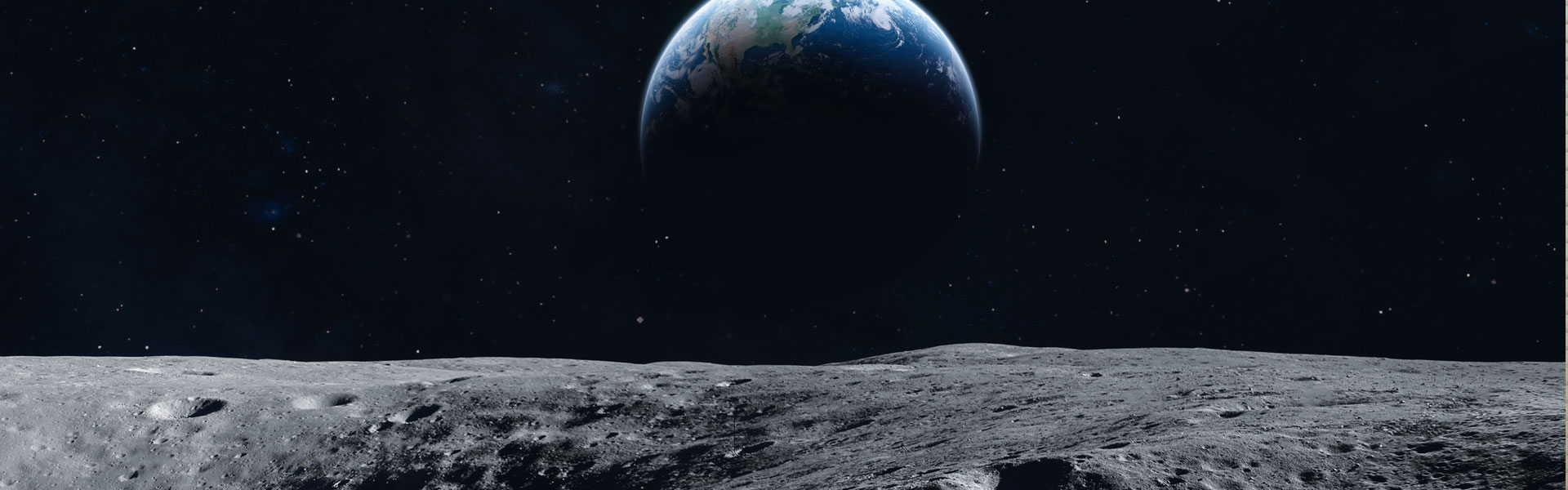 Grey lunar surface with Earth in the distance.