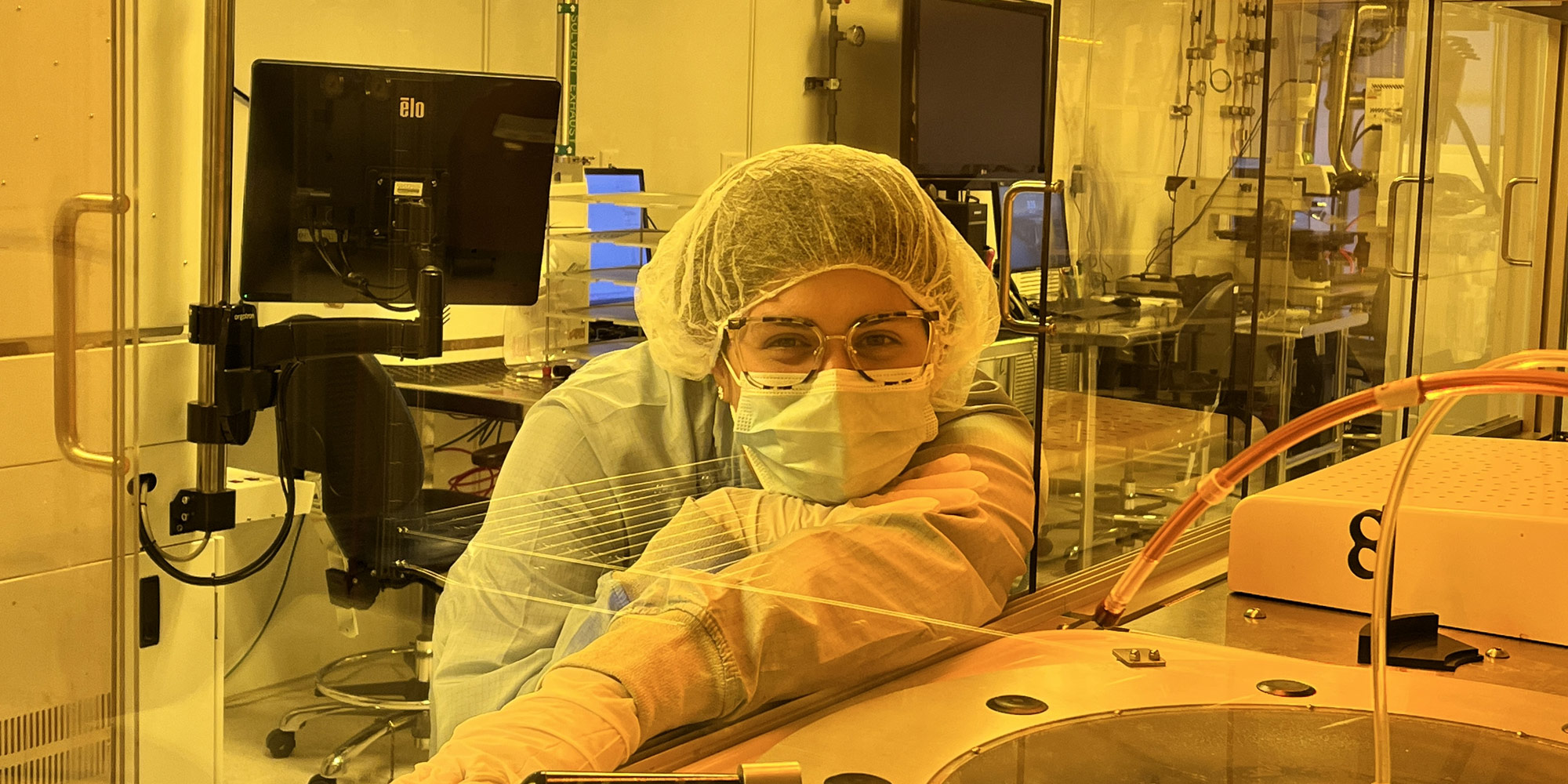From an early age, Sabrina knew nothing would stop her. Now, she’s living out her STEM career dreams at Northrop Grumman woman in microelectronics lab wearing bunny suit