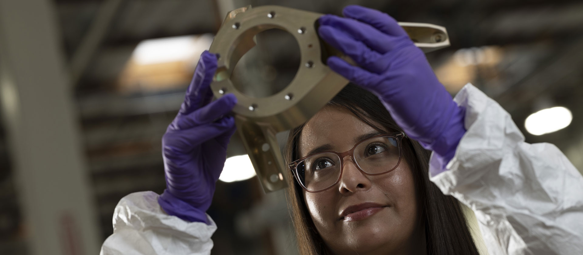 woman inspecting equipment