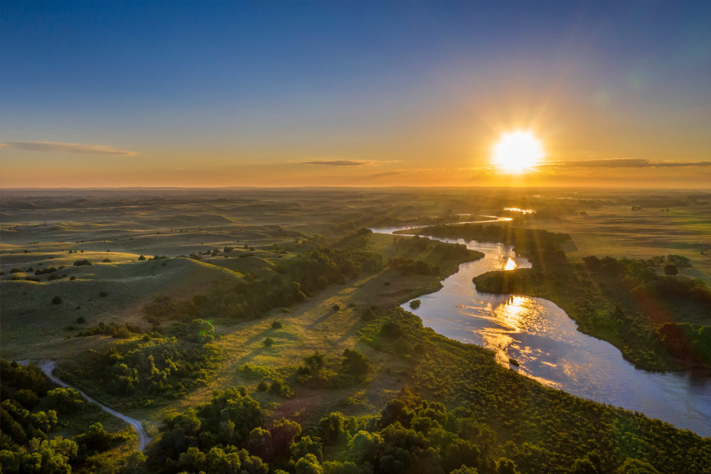 Bellevue Nebraska – Sentinel/GBSD Sunrise over river in Nebraska