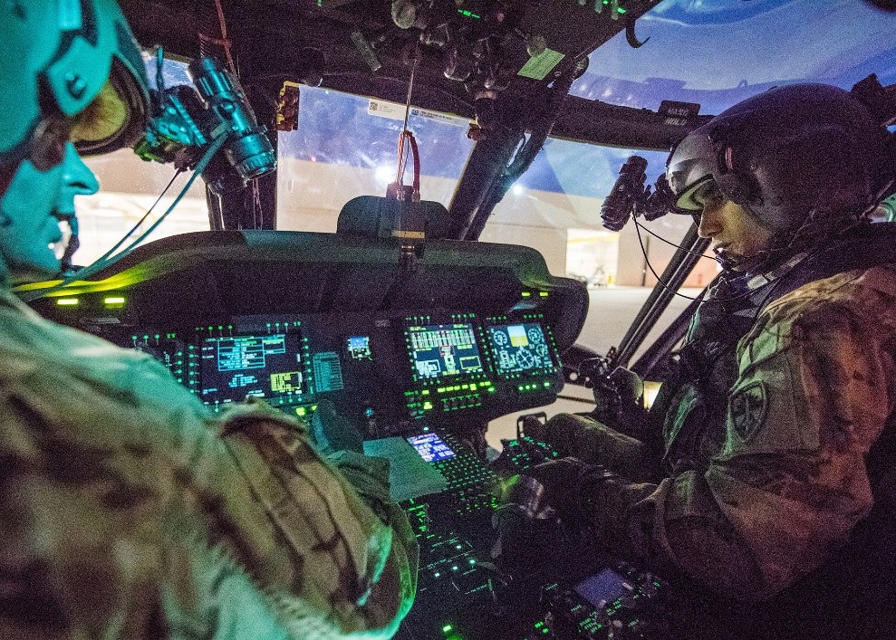 UH-60V Black Hawk Integrated Mission Equipment Package military helicopter cockpit with pilots
