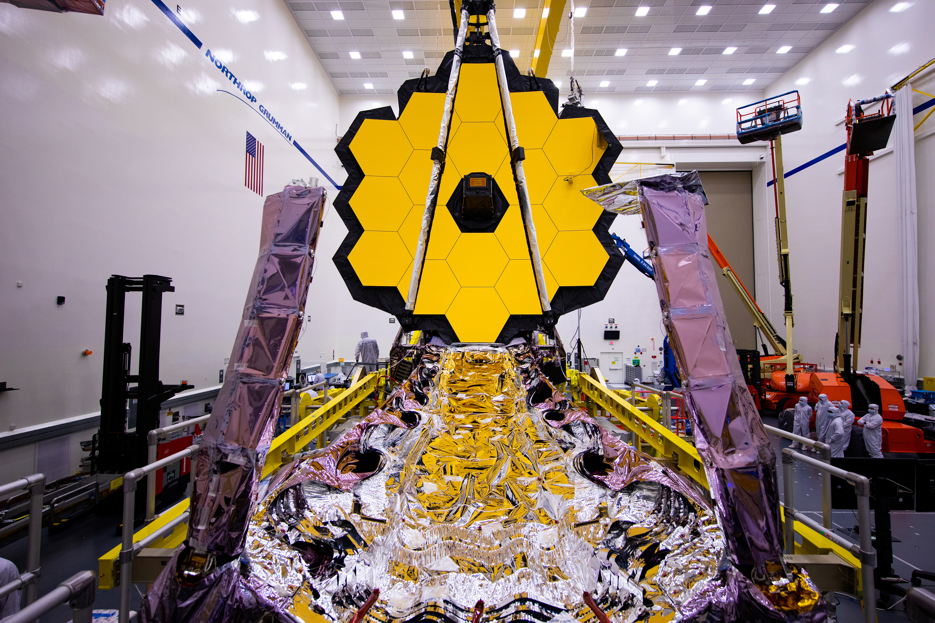 Technicians-work-on-JWST-sunshield-4 Revolutionize